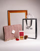 Luxury Turkish cotton throw in rich burgundy, paired with artisan salted caramel popcorn and a Dyori signature gift bag — an elegant festive gift set for cozy winter comfort