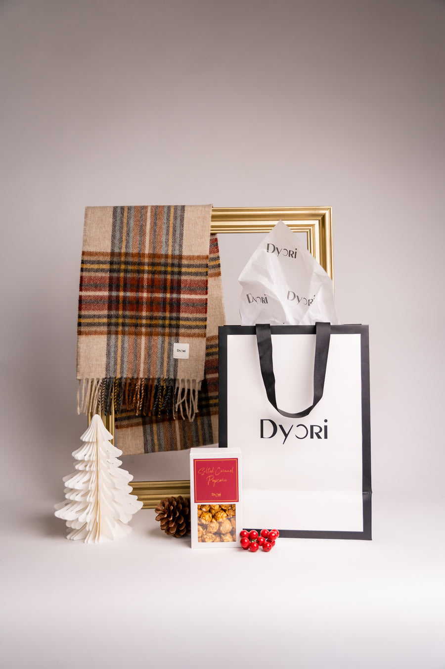 Experience luxury with Dyori’s soft beige and orange merino wool scarf, a perfect winter essential for gifting.