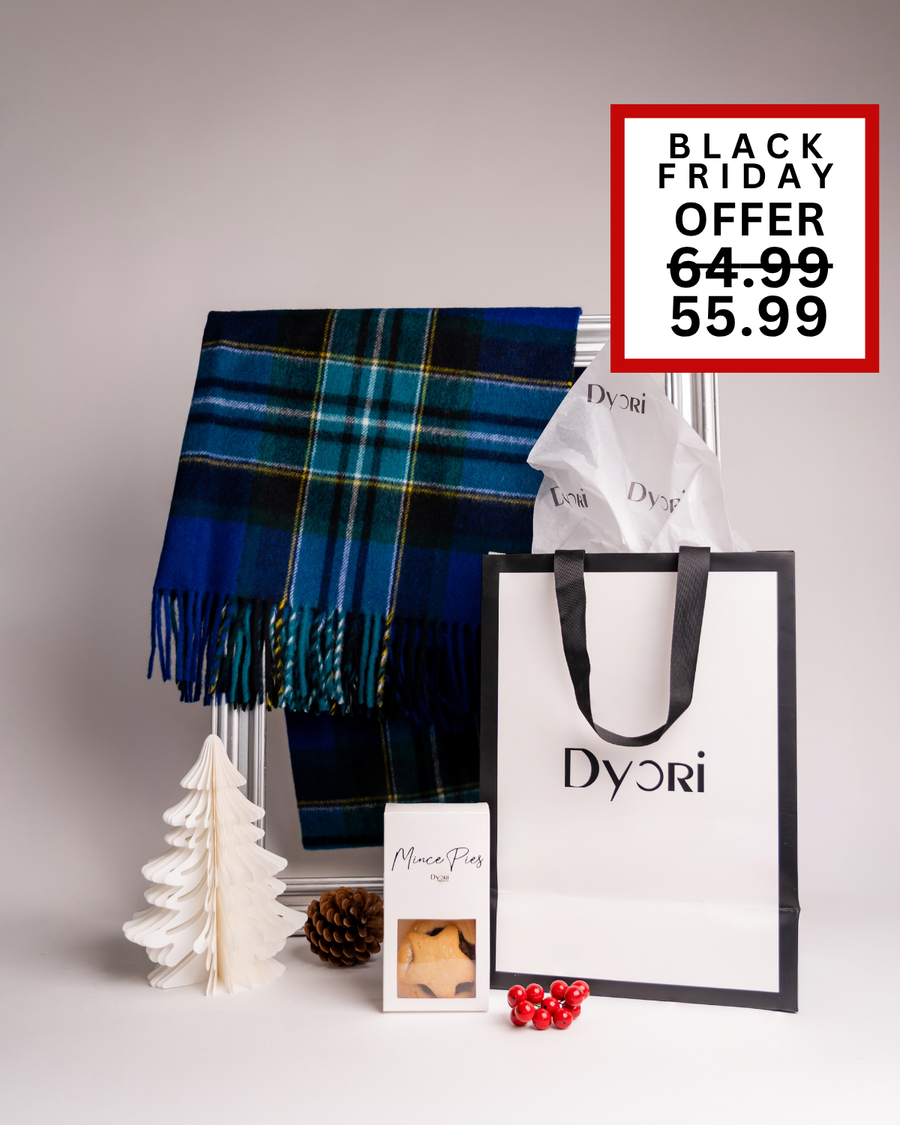 A striking Dyori gift set with a blue check scarf, mince pies, and a sleek luxury bag. Available as part of Black Friday offers, this elegant Christmas present is ideal for gifting in Malta.