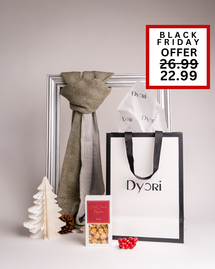 Refined and cozy Dyori gift set featuring an olive green geometric scarf, salted caramel popcorn, and a premium branded bag. A stylish and practical Black Friday gift perfect for the festive season in Malta.