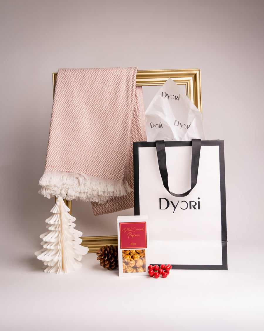 Dyori Blush Sand Shawl – A soft bamboo and cotton Turkish shawl in a delicate blush pink and cream herringbone pattern with hand-twisted fringes, perfect for layering or gifting