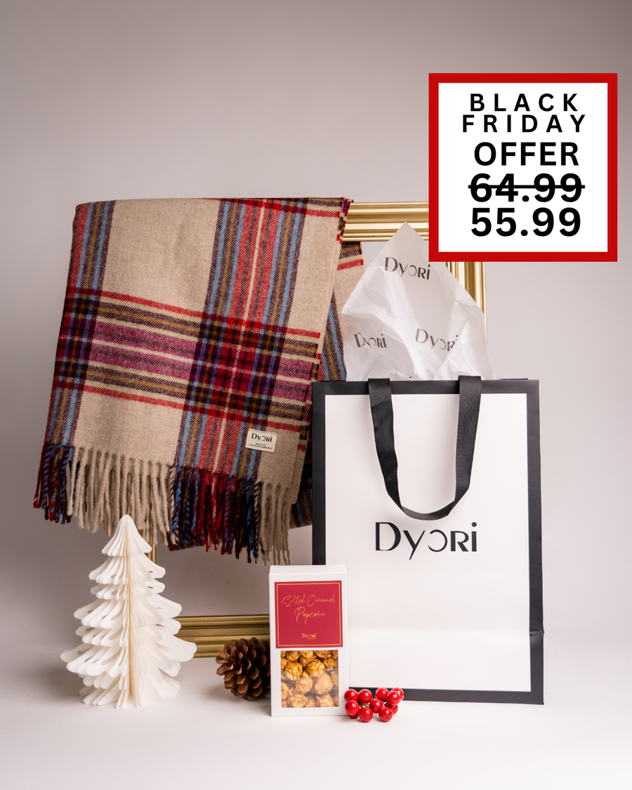 A classic plaid scarf set from Dyori featuring a beige and red tartan scarf, popcorn, and gift bag. Perfect as a timeless Christmas gift in Malta.