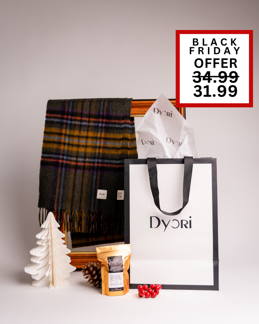 A luxurious Dyori set featuring a dark plaid scarf, truffles, and festive packaging. A warm and elegant Christmas or Black Friday gift available in Malta.