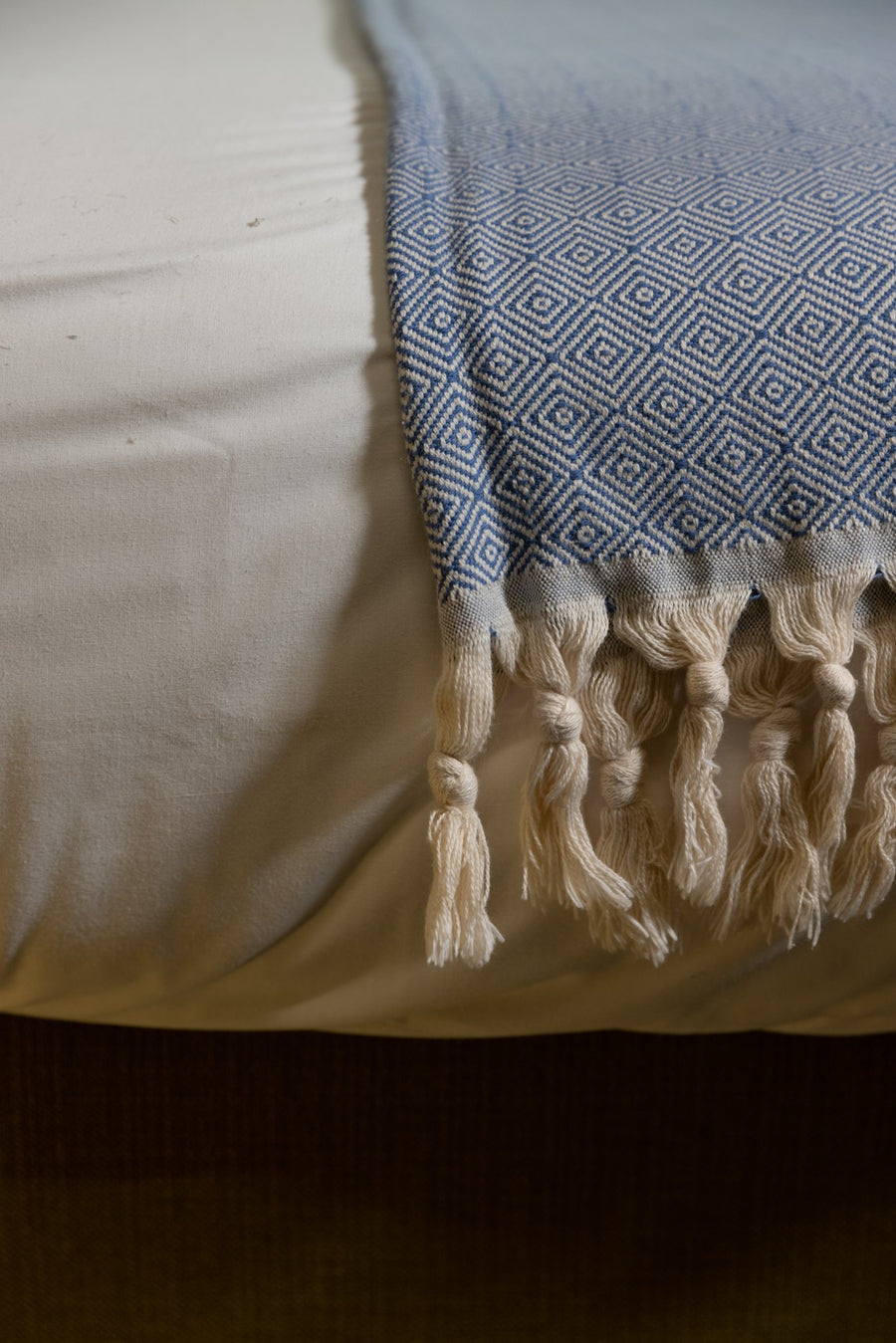 Turkish cotton royal blue diamond weave blanket with Dyori gift bag and salted caramel popcorn.