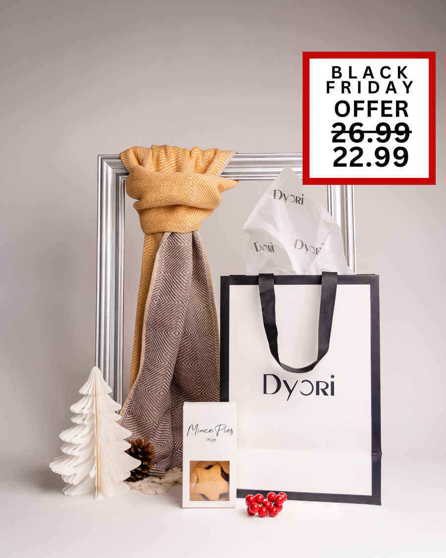 Bright and cheerful mustard yellow scarf paired with mince pies and a luxury Dyori gift bag. This Black Friday gift set combines warmth, taste, and elegance – a perfect choice for loved ones in Malta.