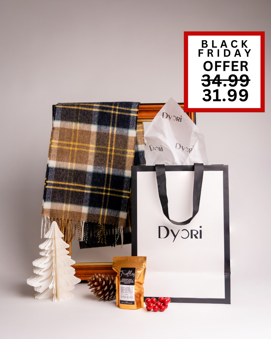 A stylish Dyori set with a navy and tan plaid scarf, truffles, and branded packaging. A luxurious Christmas or Black Friday gift for delivery in Malta.
