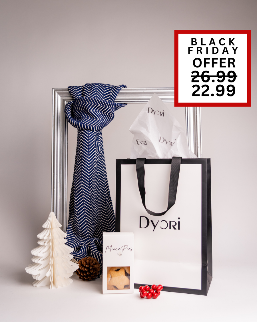 Elegant navy chevron scarf beautifully styled with Dyori’s black-and-white bag and mince pies. A refined luxury Christmas gift set in Malta, discounted to €22.99 for Black Friday (was €26.99).