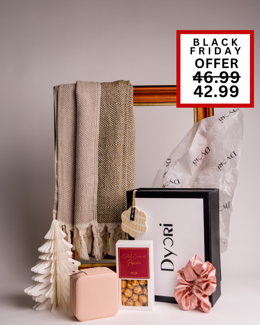 A warm and stylish Dyori gift set including a beige scarf, pink case, scrunchie, and popcorn snack. A thoughtful and elegant gift idea for her or a teacher this Christmas in Malta.