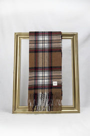 A beautifully folded brown, beige, and red checkered scarf displayed on a gold frame. Crafted for warmth and style, it’s the perfect Christmas or end-of-year gift for teachers. Comes nicely packed and delivered anywhere in Malta.