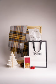 Soft Wool tartan scarf in yellow, brown, and grey tones with subtle red accents and fringed edges