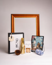 Luxury Christmas gift hamper by Dyori Malta featuring a golden Bottega prosecco bottle, artisan mince pies, a Malta-inspired art print, and eco-friendly packaging. The perfect festive hamper for men, women, teachers, or corporate gifting. Sustainable, luxury, and locally delivered — an ideal Christmas gift in Malta.