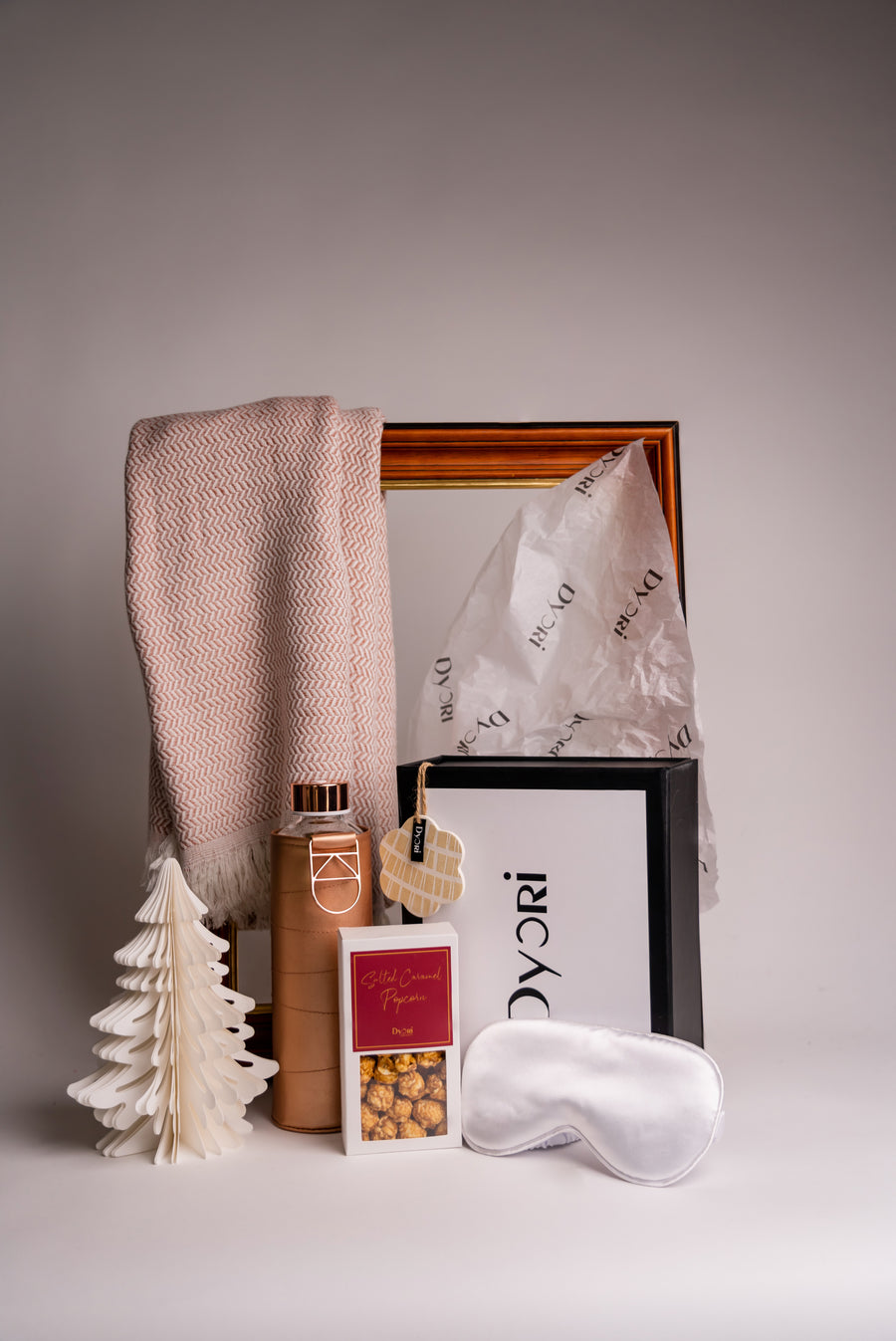 Luxury Christmas gift hamper from Dyori Malta featuring a soft Bamboo and Cotton scarf, eco-friendly accessories, salted caramel popcorn, and a satin sleep mask. Perfect for men, women, teachers, or corporate gifts in Malta. Beautifully gift packed with local delivery available.