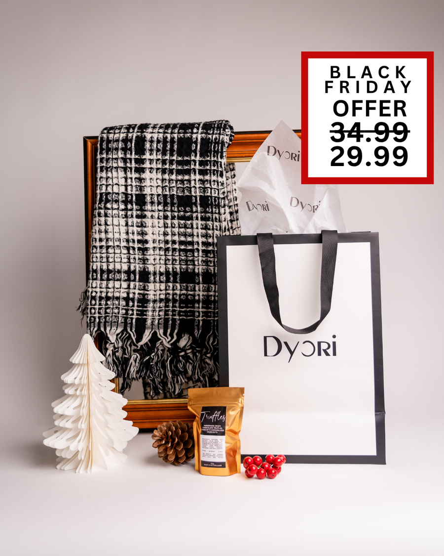 A striking black and white plaid scarf set with premium coffee and festive accents, designed by Dyori. A stylish and practical holiday gift for him or her, available across Malta.