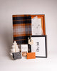 Luxury men’s Christmas gift hamper by Dyori Malta featuring a merino wool plaid scarf in rich brown and grey tones, artisan mince pies, eco-friendly socks, and a premium leather card holder. Sustainably packed in a luxury Dyori gift box with local delivery in Malta. The perfect men’s gift for Christmas, birthdays, or corporate occasions.