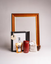 Dyori Maltese Morning Cheer Gift Box featuring an Equa reusable coffee cup, traditional Maltese coffee, artisan hazelnut chocolate truffles, and a handcrafted clay Christmas ornament in a Dyori signature gift box.