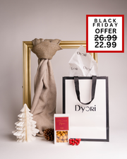 A soft neutral-toned Dyori gift set with a beige scarf, popcorn, and gift bag. A stylish and understated Christmas gift for anyone in Malta.