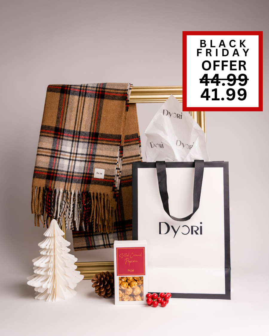 A sophisticated Dyori gift set with a tan and red plaid scarf, popcorn, and packaging. Perfect for Christmas gifting in Malta, whether for friends, teachers, or colleagues.