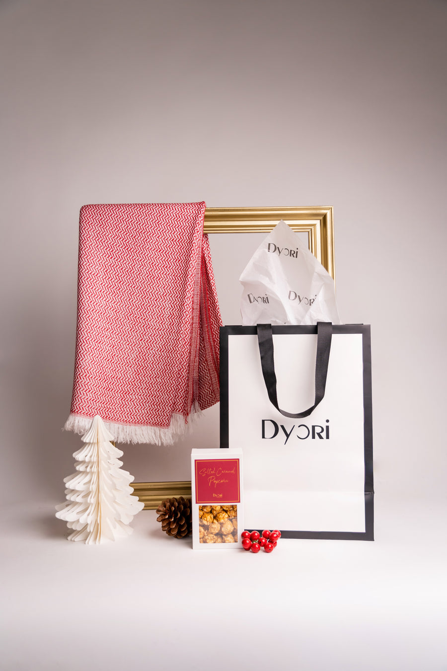 legant red cotton shawl beautifully presented with Dyori gift bag and gourmet popcorn — the perfect sustainable Christmas gift in Malta.