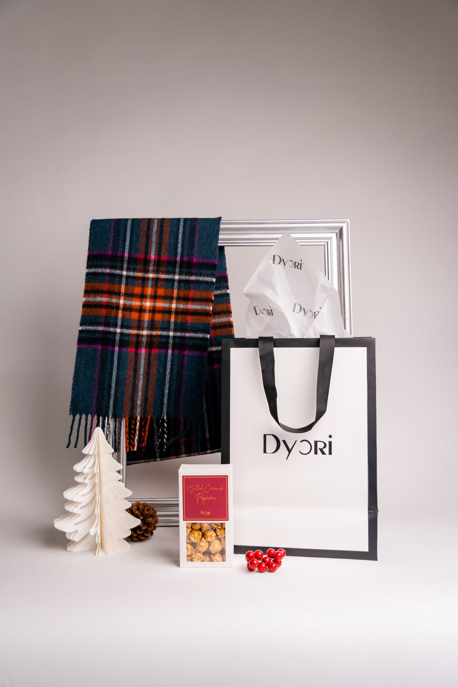 Teal Tartan scarf featuring rich orange, white and magenta stripes, woven in a soft brushed fabric with fringed ends