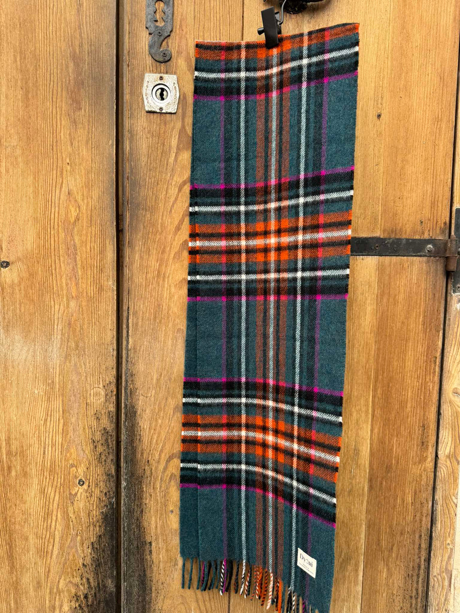 Beautiful plaid merino wool scarf in teal, rust, and magenta tones with classic fringe detailing. A cozy, elegant, and versatile winter accessory for men or women. Ideal as a thoughtful gift, delivered in Malta.