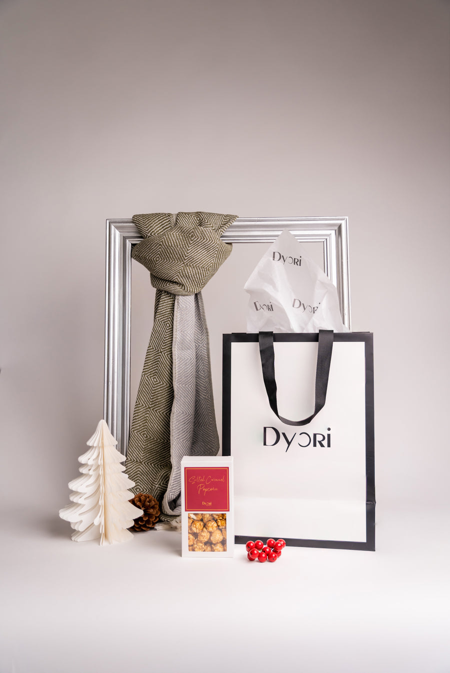 Reversible olive and stone cotton scarf made in Turkey by Dyori, featuring a soft geometric weave and lightweight, breathable texture.