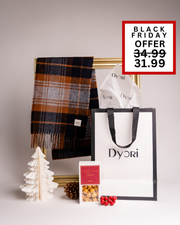 A cozy Dyori Christmas set with a brown and navy scarf, popcorn, and branded bag, ideal for festive gifting in Malta during Black Friday.