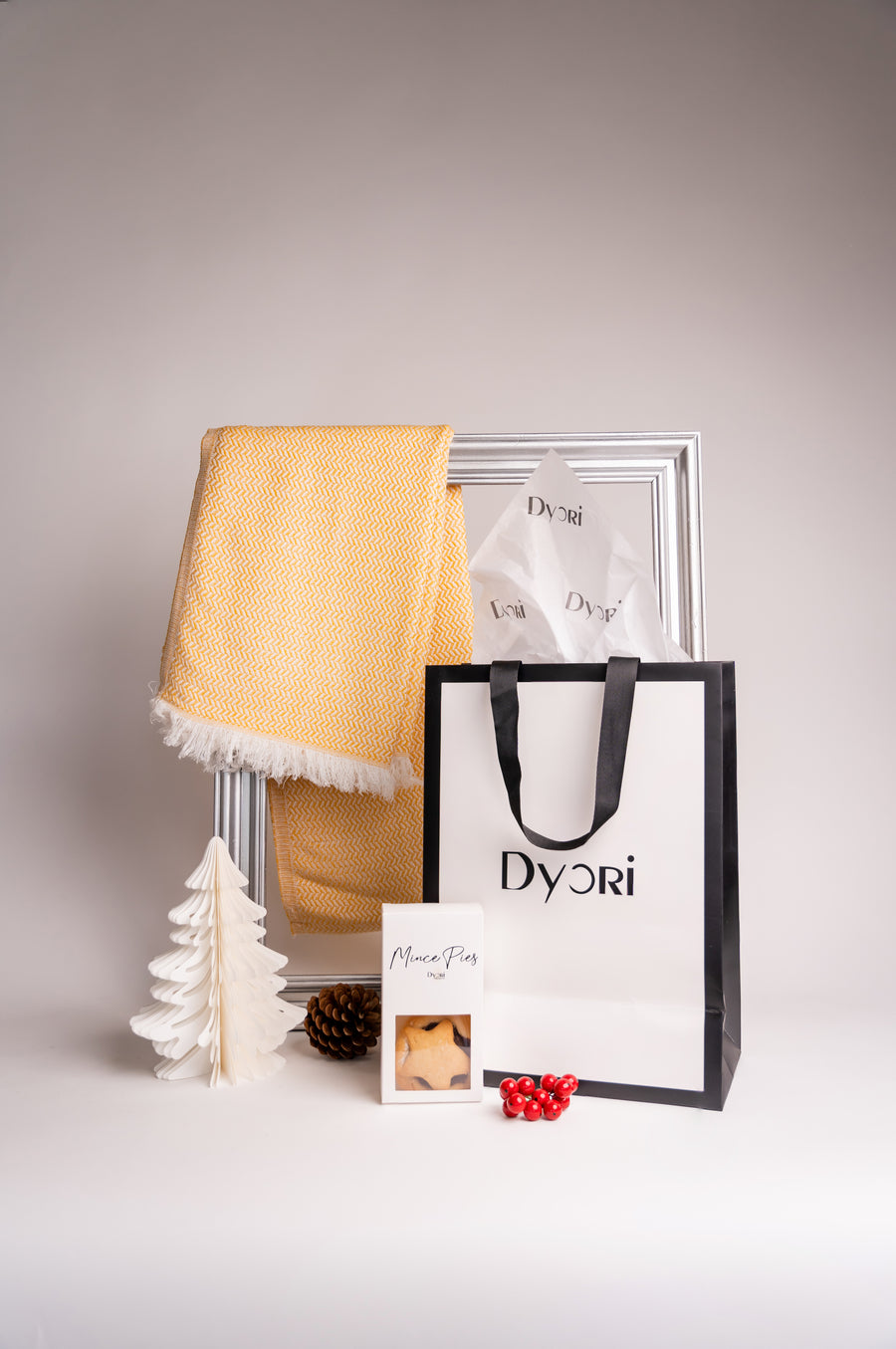Bright yellow cotton and bamboo scarf beautifully presented with Dyori packaging — a unique, sustainable Christmas or birthday gift in Malta.