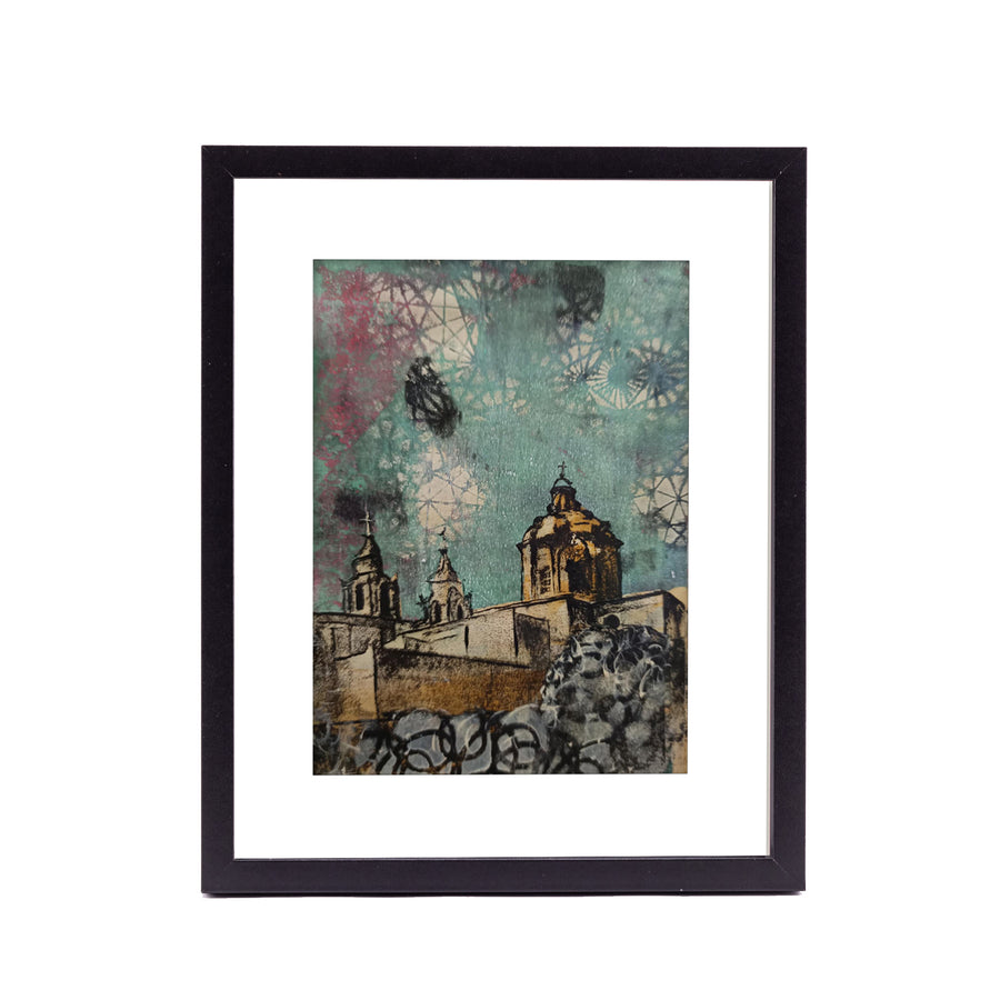 Framed Mdina art print by artist Laura T featuring cathedral domes and textured turquoise sky