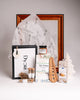Dyori kitchen-themed gift set with designer tea towel, olive wood utensil, gourmet crackers, botanical spices and pineapple jam – perfect unique gifts in Malta.