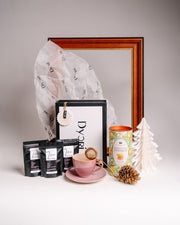 Dyori tea gift set with artisan loose leaf teas, elegant pink teacup, tea infuser, lemon curd shortbread and luxury gift bag – perfect cosy tea gifts in Malta.