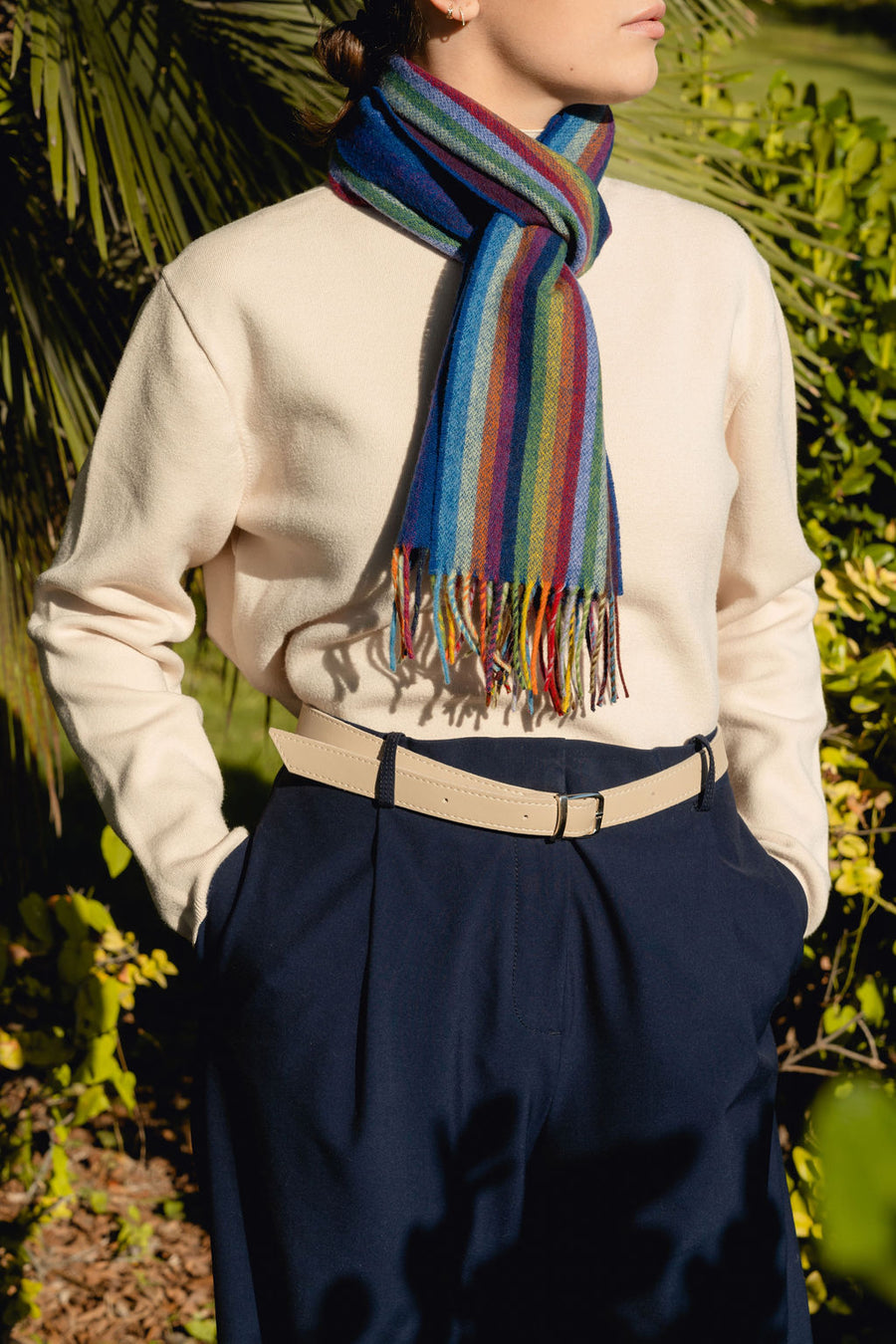 Colourful merino wool scarf with rich tones of blue, green, purple, and red. Lightweight, soft, and versatile — the perfect statement piece for any season.