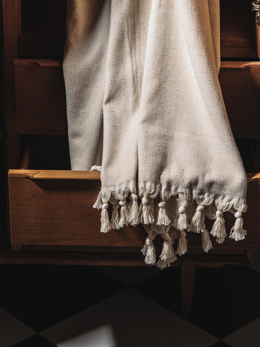 Turkish cotton beige diamond weave blanket with Dyori gift bag and salted caramel popcorn.